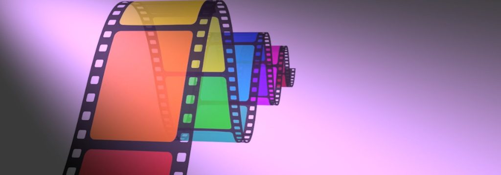 A fragment of movie film, each frame a different rainbow color